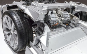 Amsterdam, The Netherlands - April 16, 2015: Tesla Model S full electric engine on a chassis on display during the 2015 Amsterdam motor show.